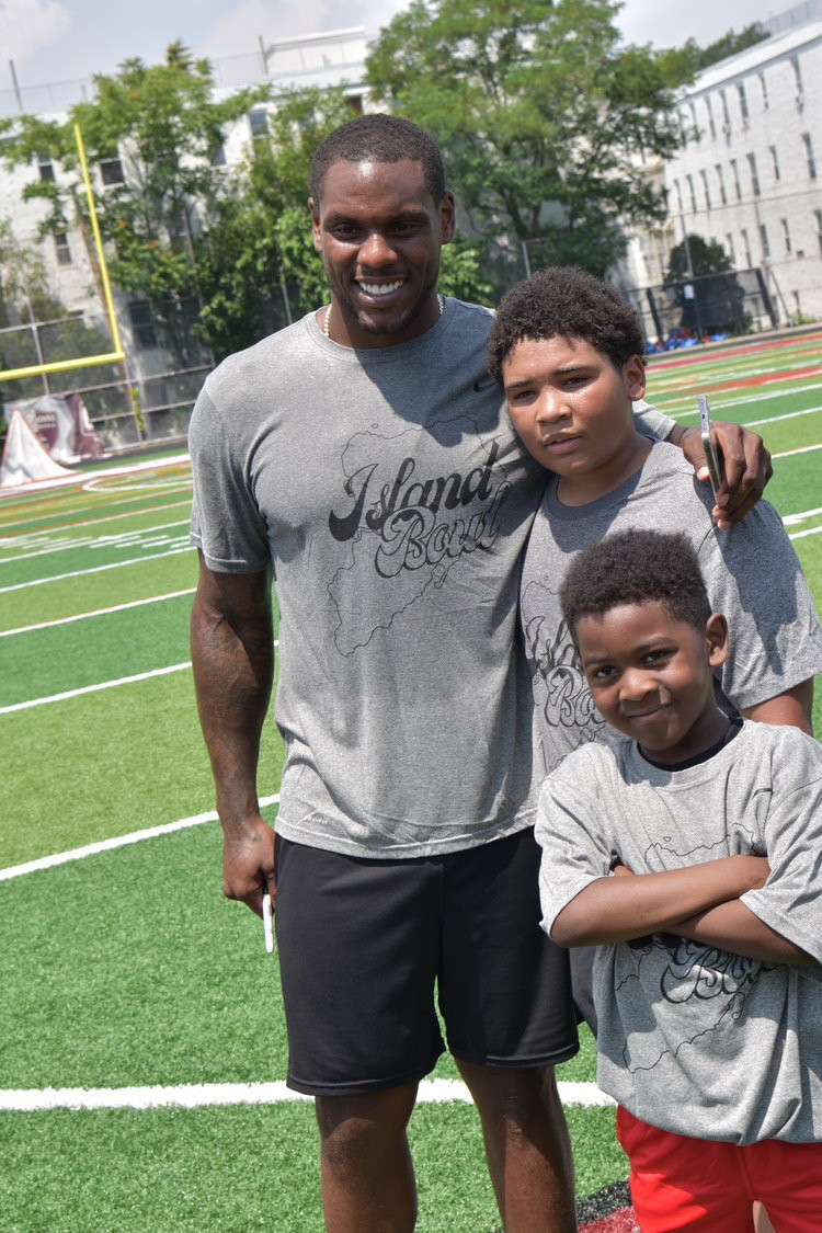 Youth sports mentorship on the football field